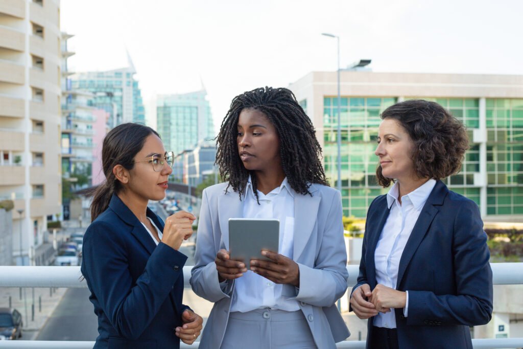 Professional businesswomen with tablet pc
